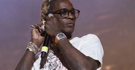 Young Thug Drowns His Daughter In Gucci For Her .